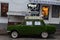 Soviet car overgrown with grass.