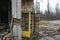 Soviet yellow telephone booth on street of abandoned ghost town Pripyat, Chornobyl exclusion zone. December 2019