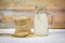 Soybean and dried soy beans on white bowl - Soy milk in glass jar for healthy diet drink and natural bean protein