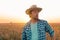 Soybean farmer portrait in field