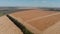 Soybean harvesting by combine harvester aerial view