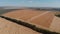 Soybean harvesting by combine harvester aerial view