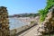 Sozopol central beach view through the historical southern walls over the BLack sea cove in Sozopol, Bulgaria, Europe