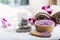 Spa accessories aromatic candle, orchid flower, salt scrub and towel