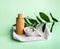 Spa accessories - scrub, sponge, facial brush, face mask, essential oil on a light background, top view. Healthy lifestyle concept