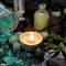 Spa arrangement - natural massage oil with a burning candle