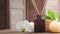 Spa background. Towel, candles, flowers, massaging stones and herbal balls. Massage, oriental therapy, wellbeing and