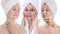 Spa and beauty concept. Aged good looking woman with white towel on her head. UK