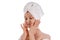 Spa and beauty concept. Aged good looking woman with white towel on her head. UK