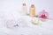 Spa, beauty and wellness products: cream, sea salt, towels, decorated with orchid flower and candle with copy space.