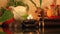 Spa composition burning candles, stones for body massage, aromatic herbs and cup for tea ceremony. Close up massage