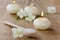 Spa composition with sea salt bath in wooden spoon, jasmine flowers