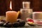 Spa composition with sea salt, candles, soap, shells, creams for face on wooden background.