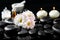 Spa concept of white daisy flowers, candles, fragrance oil and z