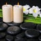 Spa concept of zen basalt stones, two white flower frangipani