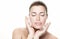 Spa Face Woman applies ice cubes on face. Healthy clean skin. Cold Beauty Treatments