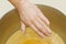 spa hand treatment and beauty,Hand in paraffin bath ,woman receiving heat therapy on hands