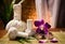 Spa herbal compressing ball with candles and orchid