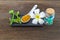 Spa herbal white frangipani flowers, turmeric powder in white spoon ,pill,Cissus Quadrangularis Linn on wooden background