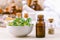 Spa Ingredients, essential oil with oregano leaves for aromatherapy setup on