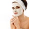 Spa Mask. Woman in Spa Salon. Face Mask. Facial Clay Mask.
