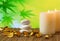 Spa massage border background with candle near stone and wood