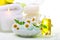 Spa relaxation theme with flowers, bath salt, essential oil and candles