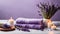 Spa resort concept - Close up of lilac with towels, candles and stones