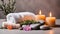 Spa resort concept - Close up of rosemary with towels, candles and stones