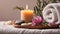 Spa resort concept - Close up of rosemary with towels, candles and stones