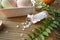 Spa resort setting. Still life close up image with sea salt bottle and bath bombs on bamboo mat