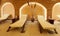 Spa restroom interior and wooden beds with white towels