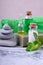 Spa set: massage stones, aromatic oil, sea salt, green gel, organic soap and green towel