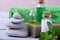 Spa set: massage stones, aromatic oil, sea salt, green gel, organic soap and green towel