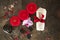 Spa set. Top view: candles, massage stones, towel on natural background