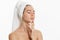 Spa skin care beauty woman wearing hair towel after beauty treatment. Beautiful young woman with perfect skin isolated