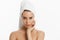Spa skin care beauty woman wearing hair towel after beauty treatment. Beautiful young woman with perfect skin isolated