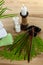 SPA still life with aromatic burning candles, stones, towel and lavender bath salt