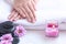 Spa treatment and product for female feet and manicure nails spa with candlelight and pink flower for relax and rest.