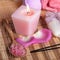 Spa treatment: sea salt, candle, soap, roses petals