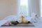Spa treatment set and aromatic massage oil on bed massage. Thai setting for aroma therapy and massage with flower on the bed,