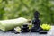 Spa and wellness composition with statuette  of Buddha, oil bottle and zen stones