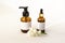 Spa wellness concept, natural cosmetics unbranded blank packages and jasmine flowers, white background, close up