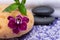 Spa Wellness Concept. Natural Foam Bath & Shower Sea Sponge, stacked Basalt Stones, Bamboo, Orchid Flower and Lavender Epsom Salt