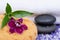 Spa Wellness Concept. Natural Foam Bath & Shower Sea Sponge, stacked Basalt Stones, Bamboo, Orchid Flower and Lavender Epsom Salt