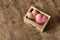 Spa and wellness concept: wooden box with pink sea salt and heart shape soap with word `love` on it