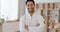 Spa, wellness and therapist man portrait with tranquil and calm expert in therapeutic workspace. Health, relaxation and