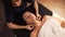 Spa woman facial Massage. Face Massage in beauty spa salon. Female enjoying relaxing face massage in cosmetology spa