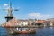 Spaarne river with canal boat and windmill, Haarlem, Netherlands