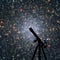 Space background with silhouette of telescope. Globular cluster